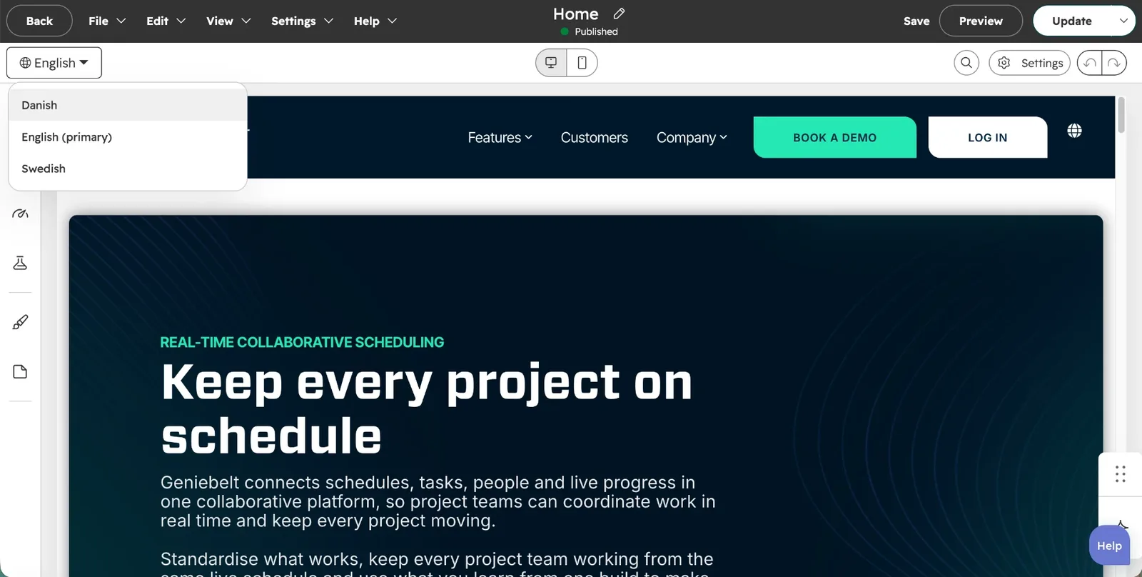 The language switcher on the live GenieBelt site